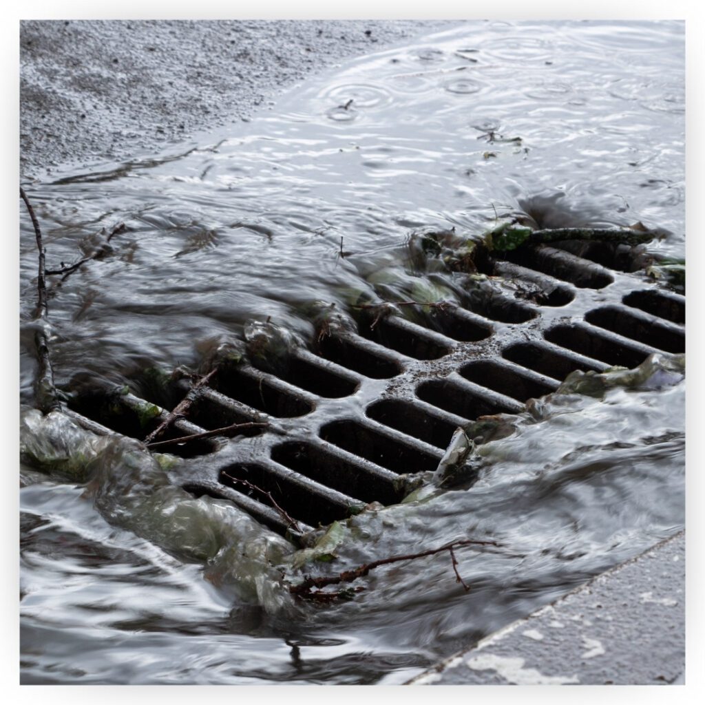 Water flowing into storm drain